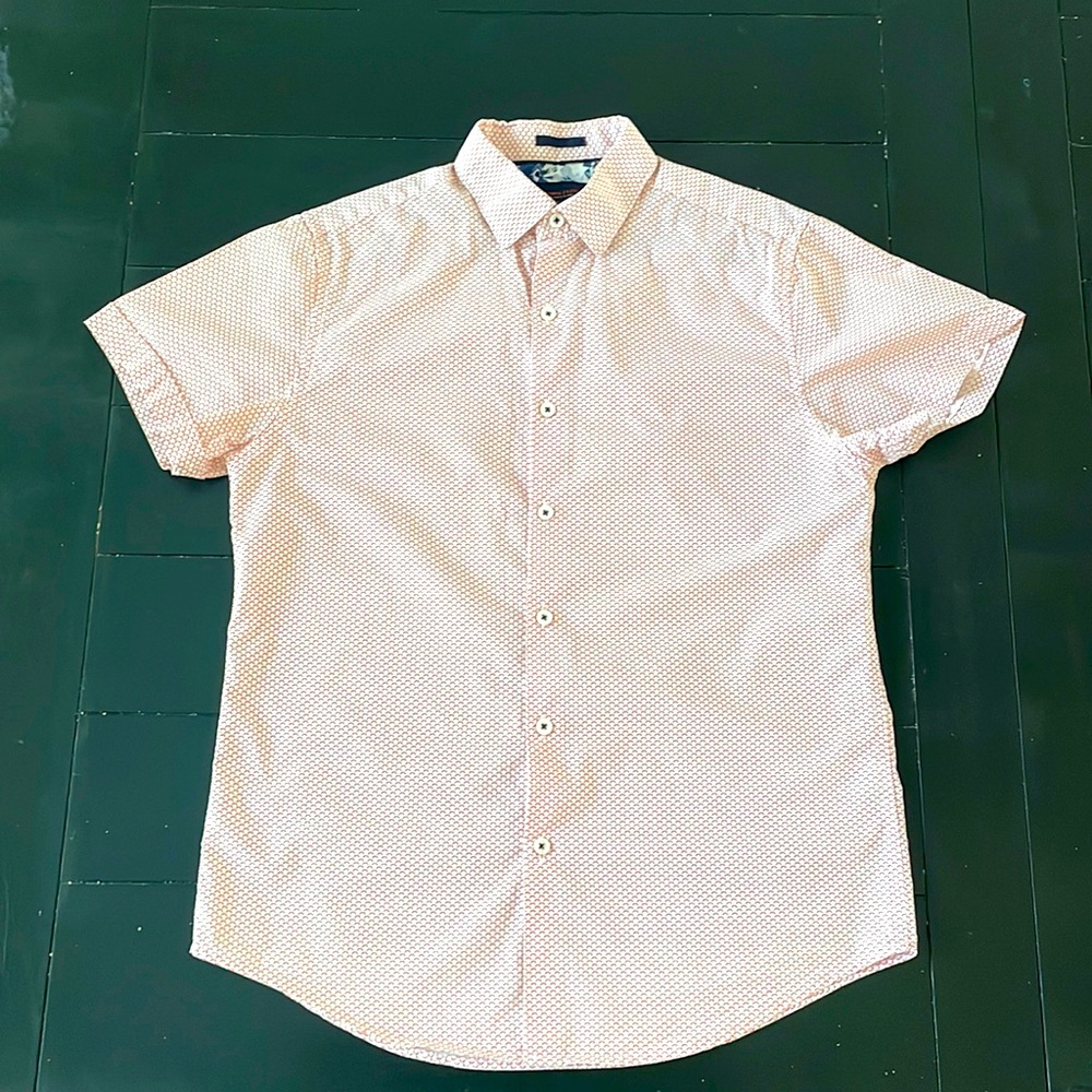 Men’s size small short-sleeve button down shirt.
